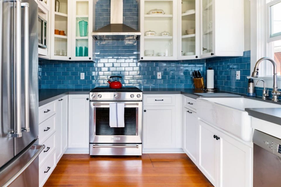 Fully equipped kitchen with modern appliances.