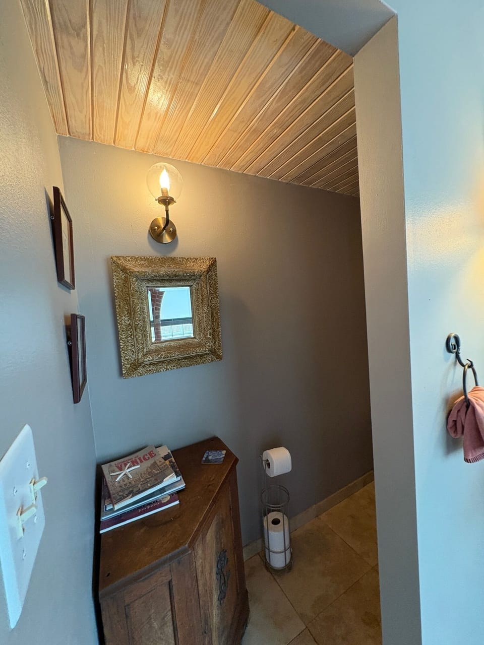 Entrance to toilet off the main bath. 