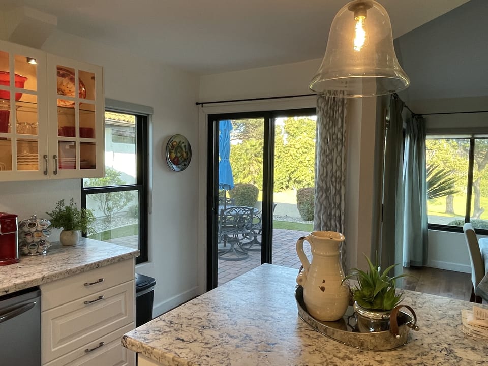 Kitchen with view out to the patio