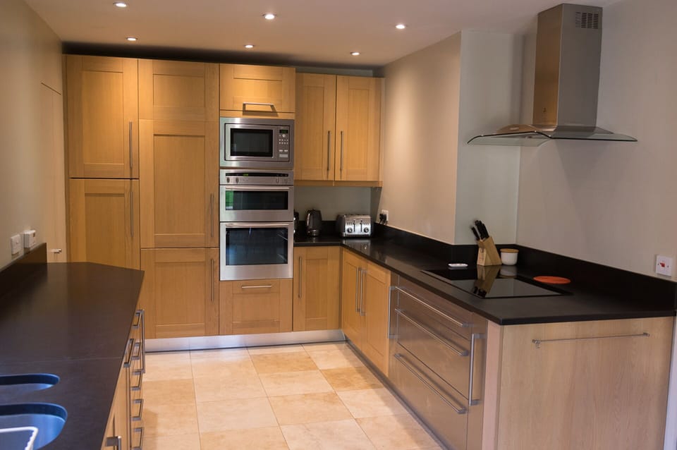 European built-ins. Induction hob. Walk-in pantry.