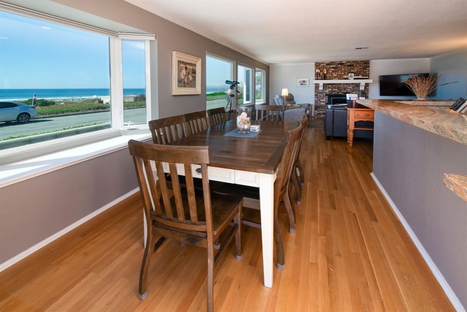 The dining area has seating for 8, a perfect spot to gather to eat or play games with the whole family