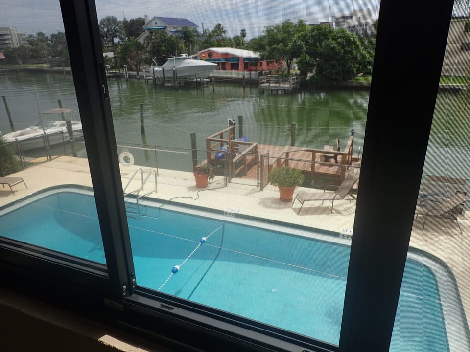 Private Balcony overlooks pool.