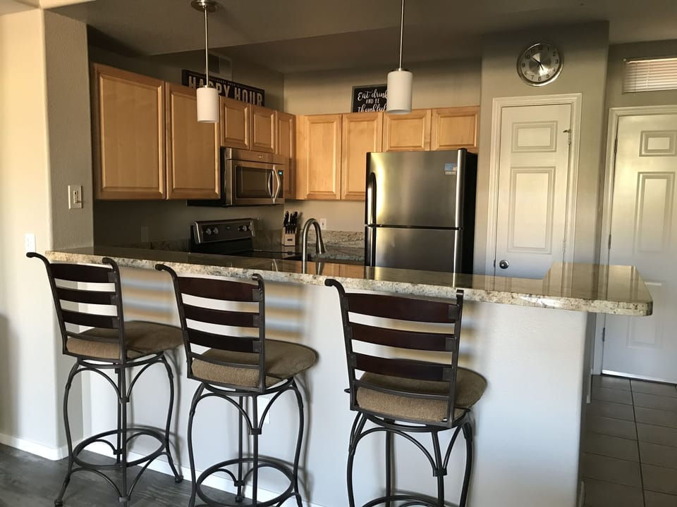 Kitchen with granite countertops and stainless steel appliances