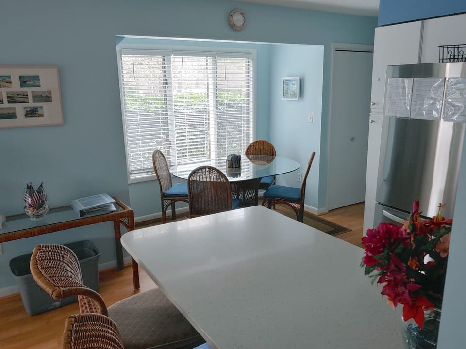 Dining Table has up to 6 chairs plus 2 at Breakfast Bar