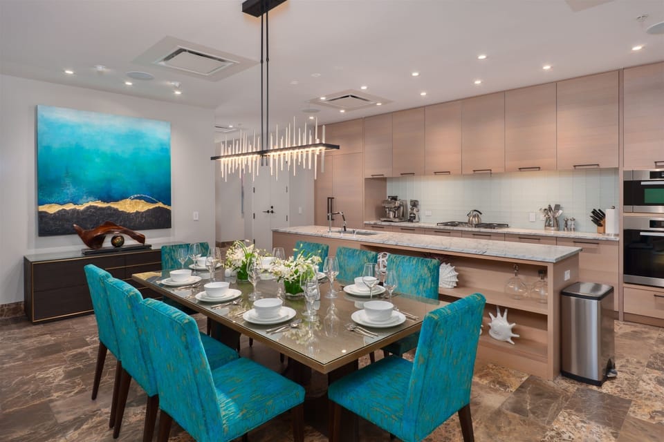 The artfully decorated dining area seats 8 guests