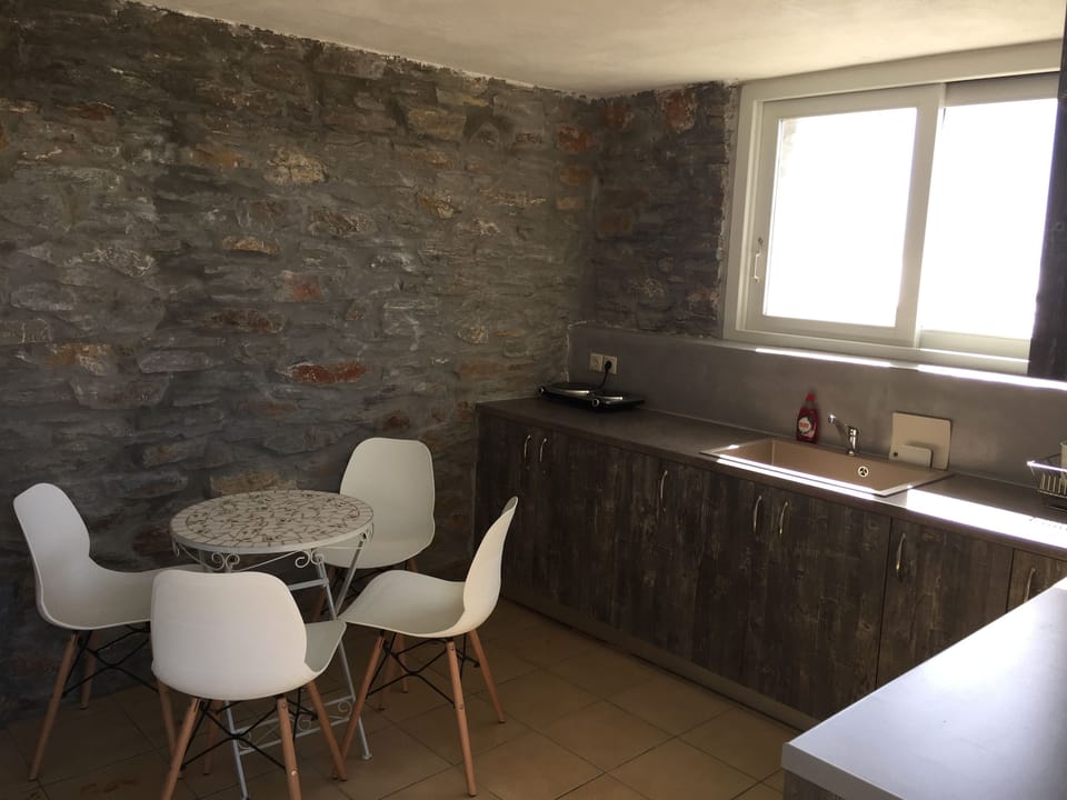 fully equipped kitchen next to the guest house
