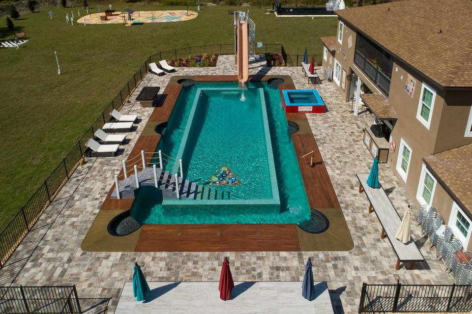 The world's first billiard table pool (and lazy river plus water cannon & slide)