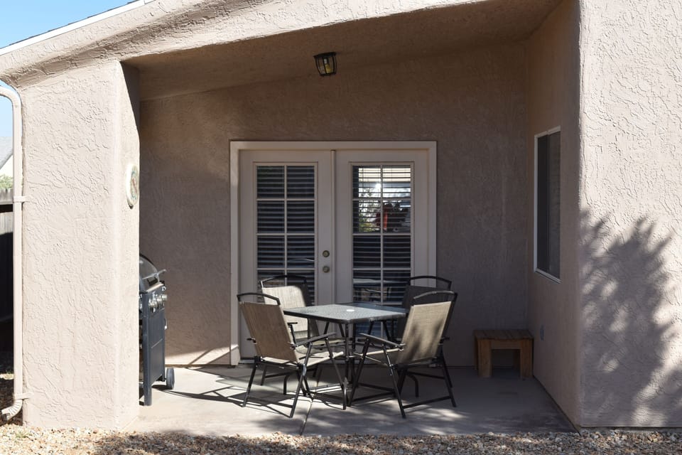 Sitting area outside with bbq