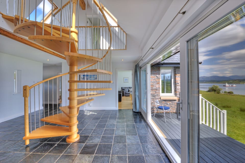 Wow!  The entrance hall with huge patio doors.