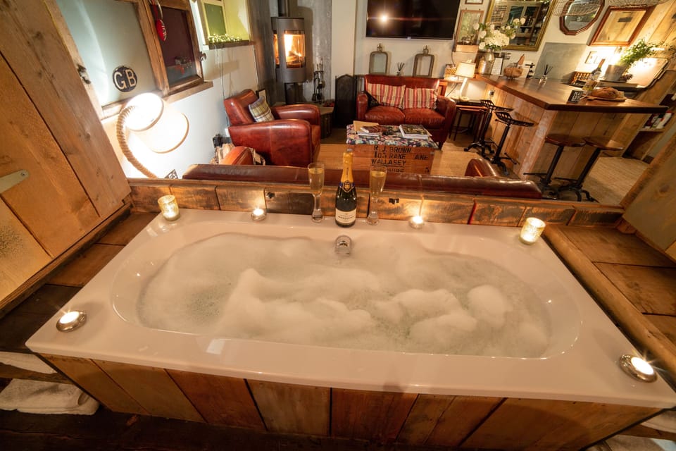 Candle lit bath infront of the fire