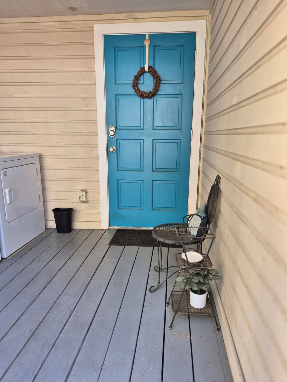 Back door entrance, which is used the most since parking is off of it.