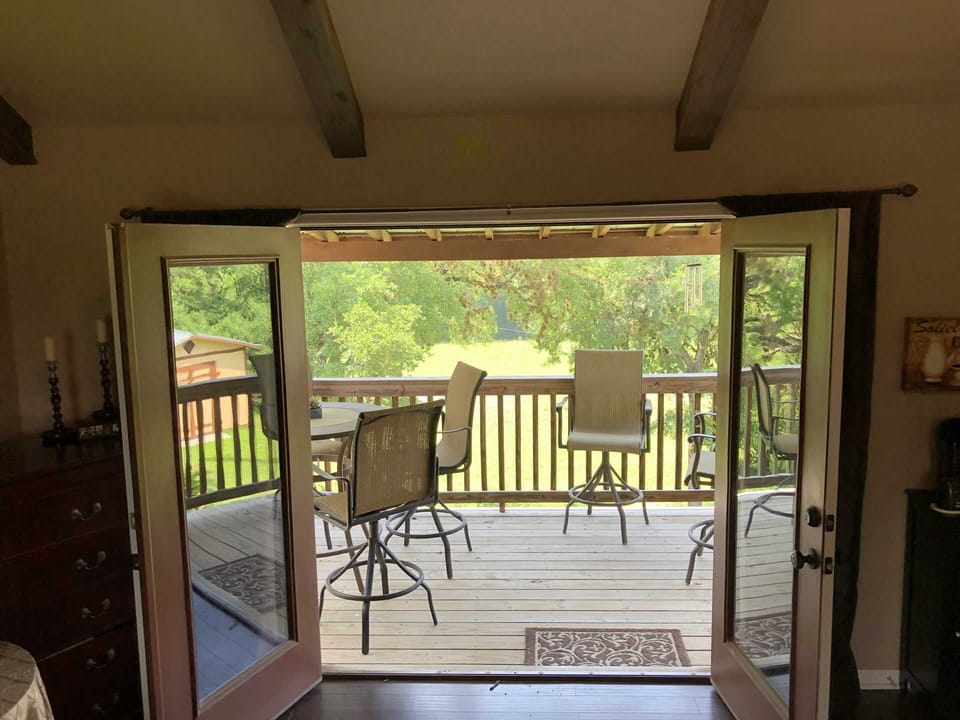 Here's a view of the elevated master suite deck, which offers an incredible view of the Medina River and the Hill Country beyond.