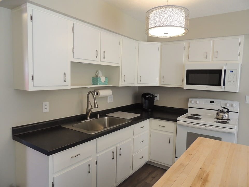 Kitchen with brand new appliances. 