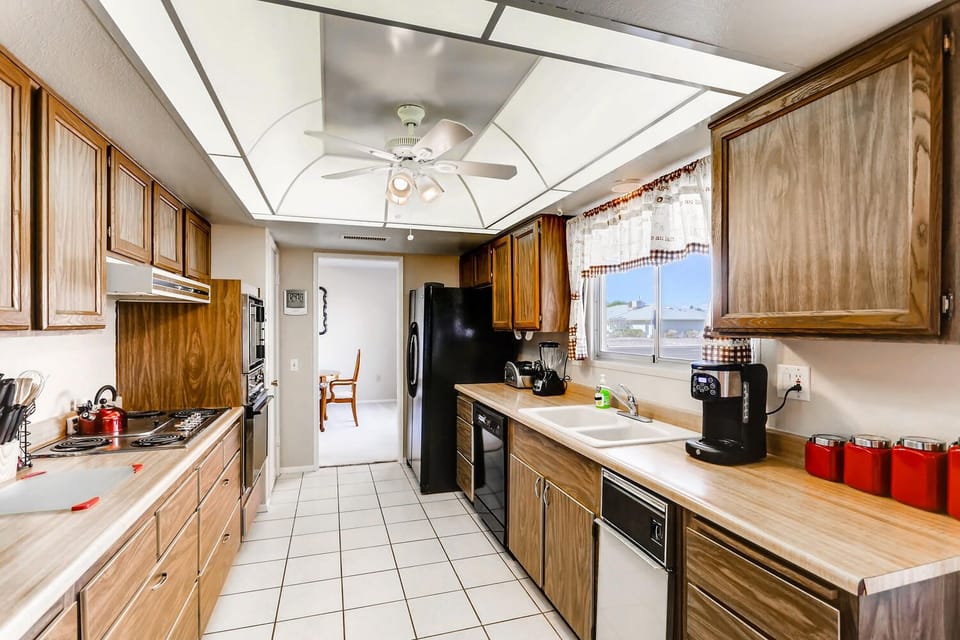 Wall Oven, Microwave, Jenn Aire Grill + 4 burner cooktop. Fridge with Icemaker