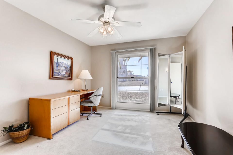 Bedroom 3 as an office with a view of the Catholic Church & southern Skies