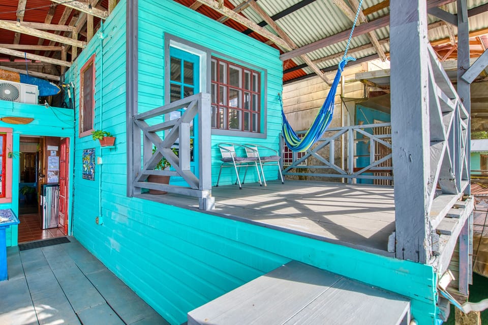 Oceanfront room with queen size bed, walk-in closet and attached private bath.