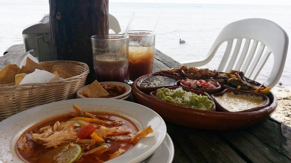 Enjoy local cuisine.  Ahhh...the botaneros & tortilla soup at La Buena Vida!