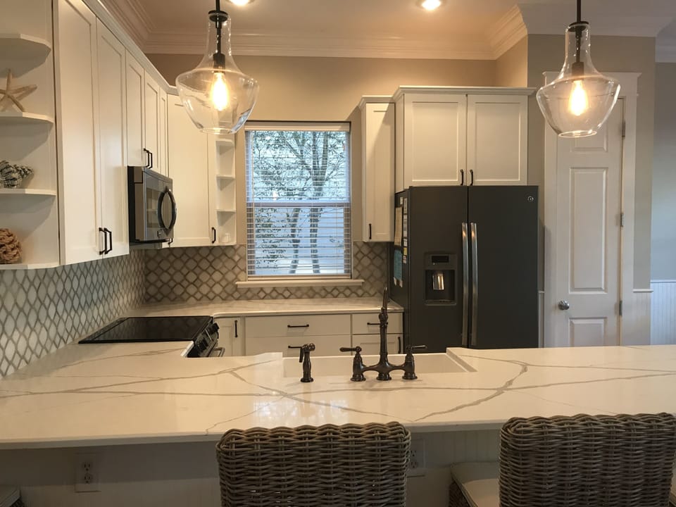 Beautiful updated kitchen with counter eating area for four