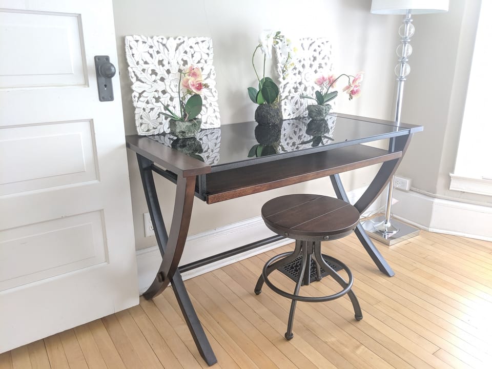 Queen bed desk area