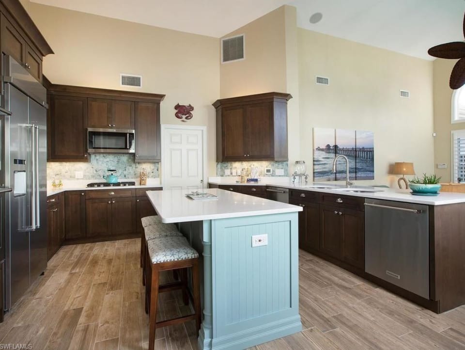 Kitchen view #3; two dishwashers; microwave, Keurig coffee maker