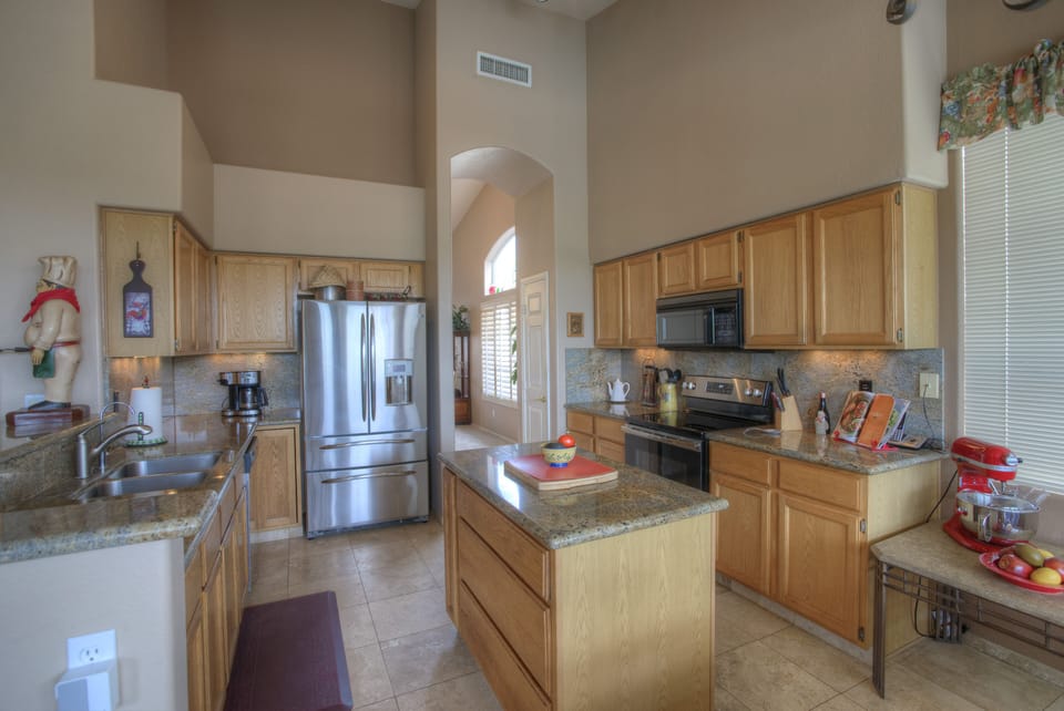 Fully equipped, Gourmet kitchen with granite counters and stainless appliances