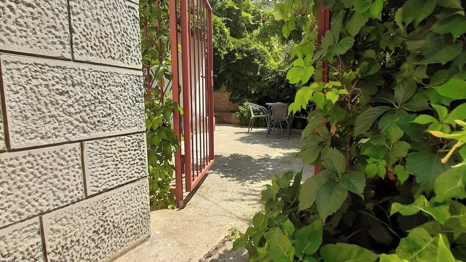 The entrance to the garden behind the apartment