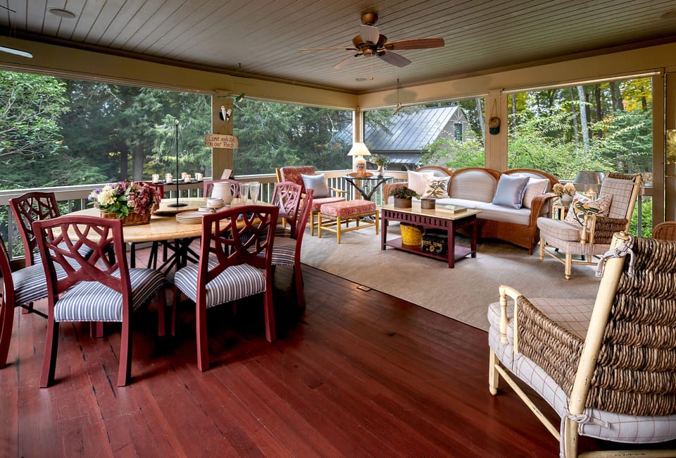 Large beautiful screened porch comfortably sits 10 for dinner and drinks. 
