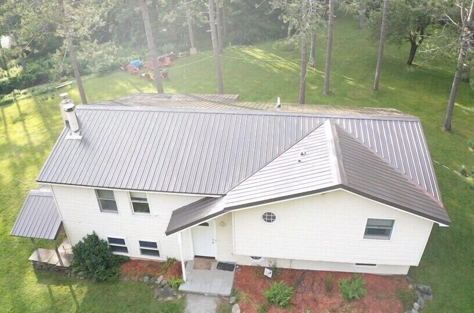 Drone view showcasing newly installed steel roof