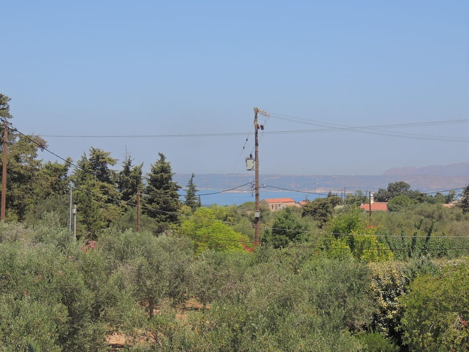 View over countryside to the sea from Pegasus upstairs dining and lounge terrace