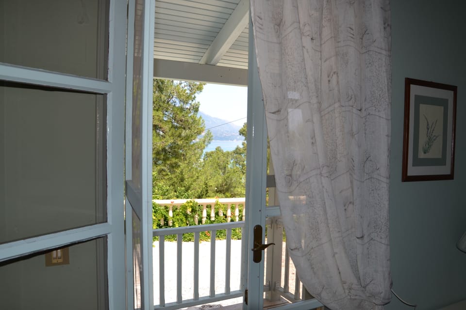 One of the bedrooms offers a double bed. Kefalonia bungalows