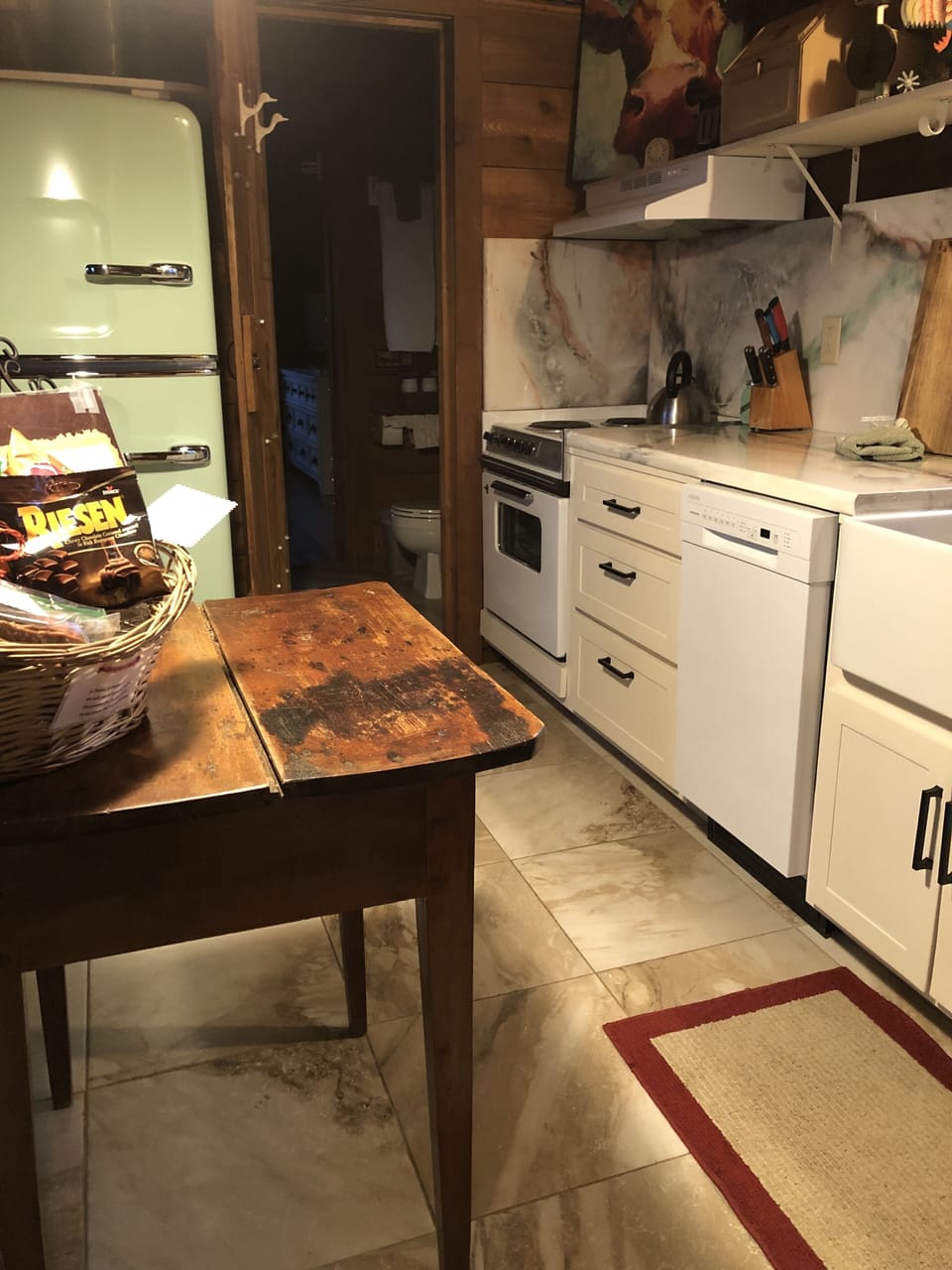 Vintage look refrigerator, farm sink, garbage disposal and now... a dishwasher