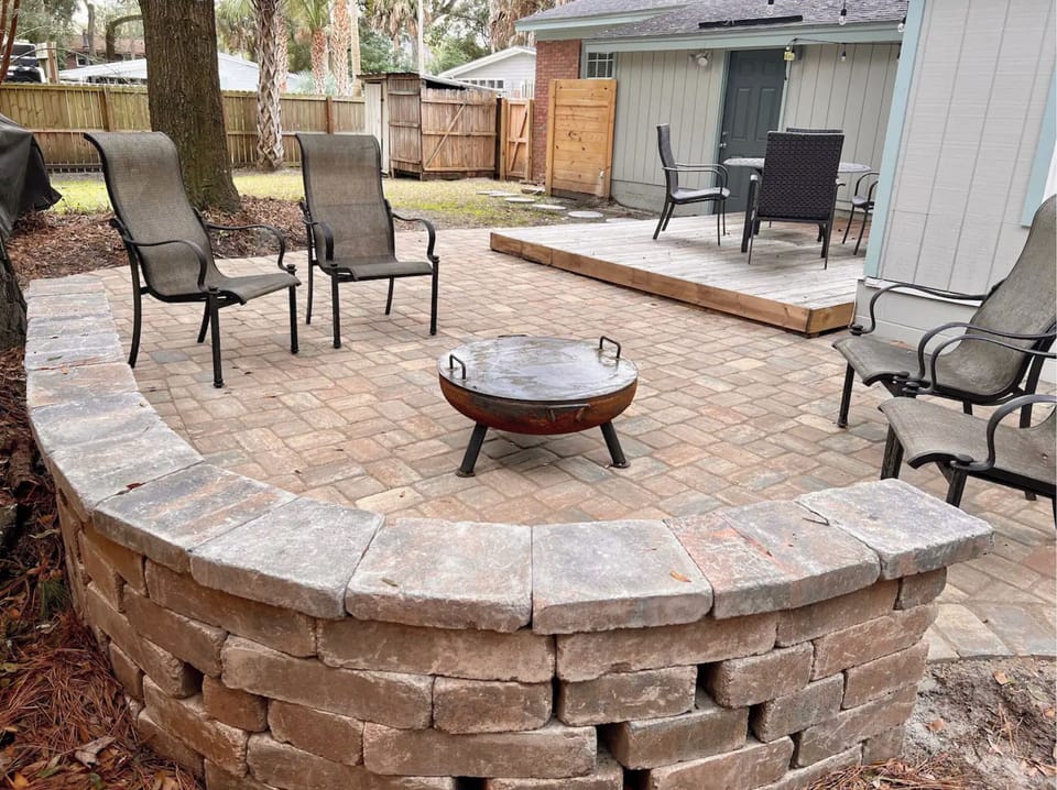 Fenced backyard with bbq and firepit
