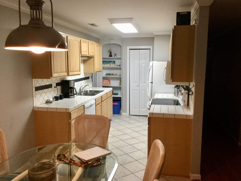 Kitchen with nice cookware and dinnerware...