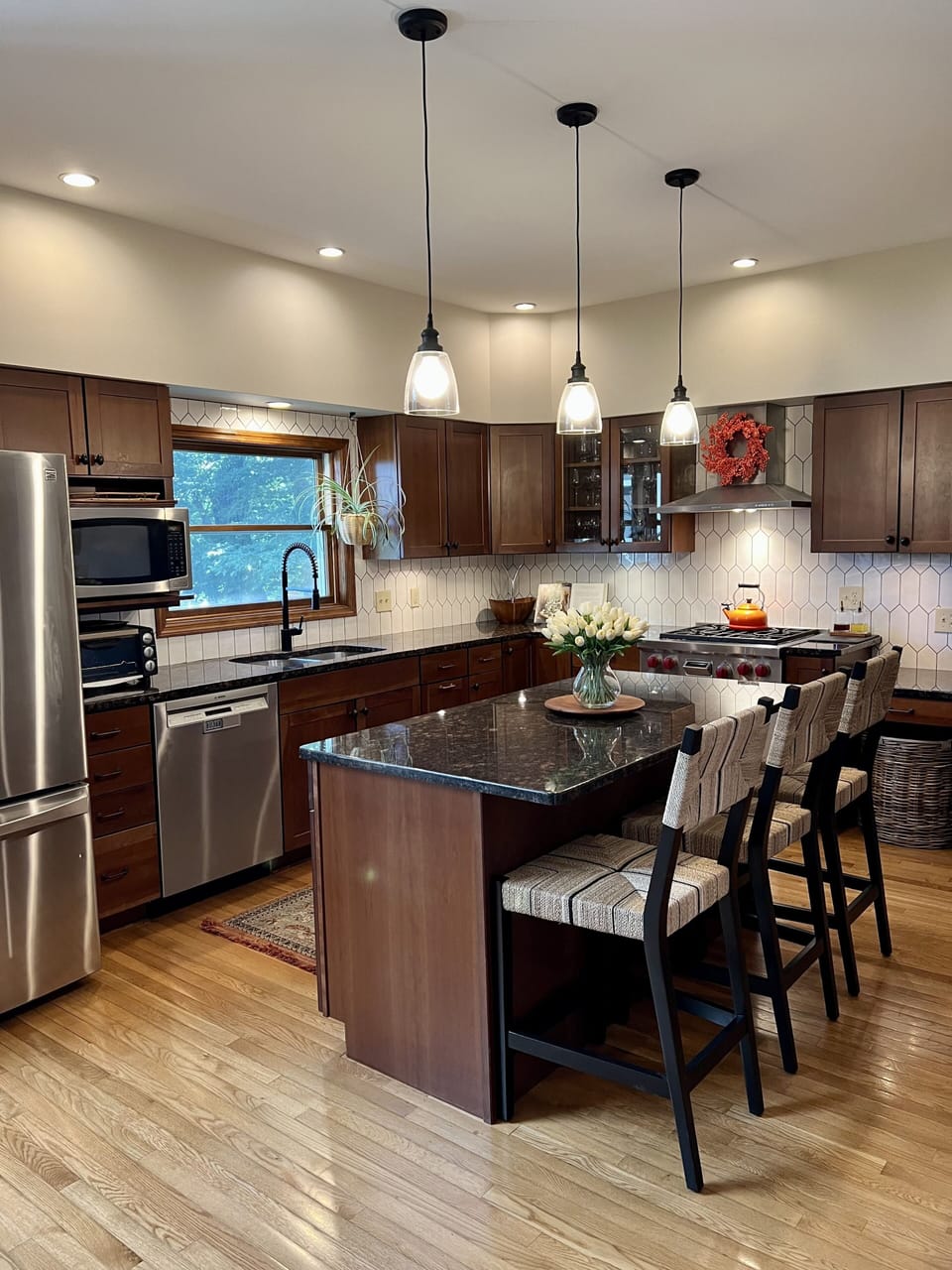 Fully equipped, updated kitchen with stainless steel including a Wolfe gas range