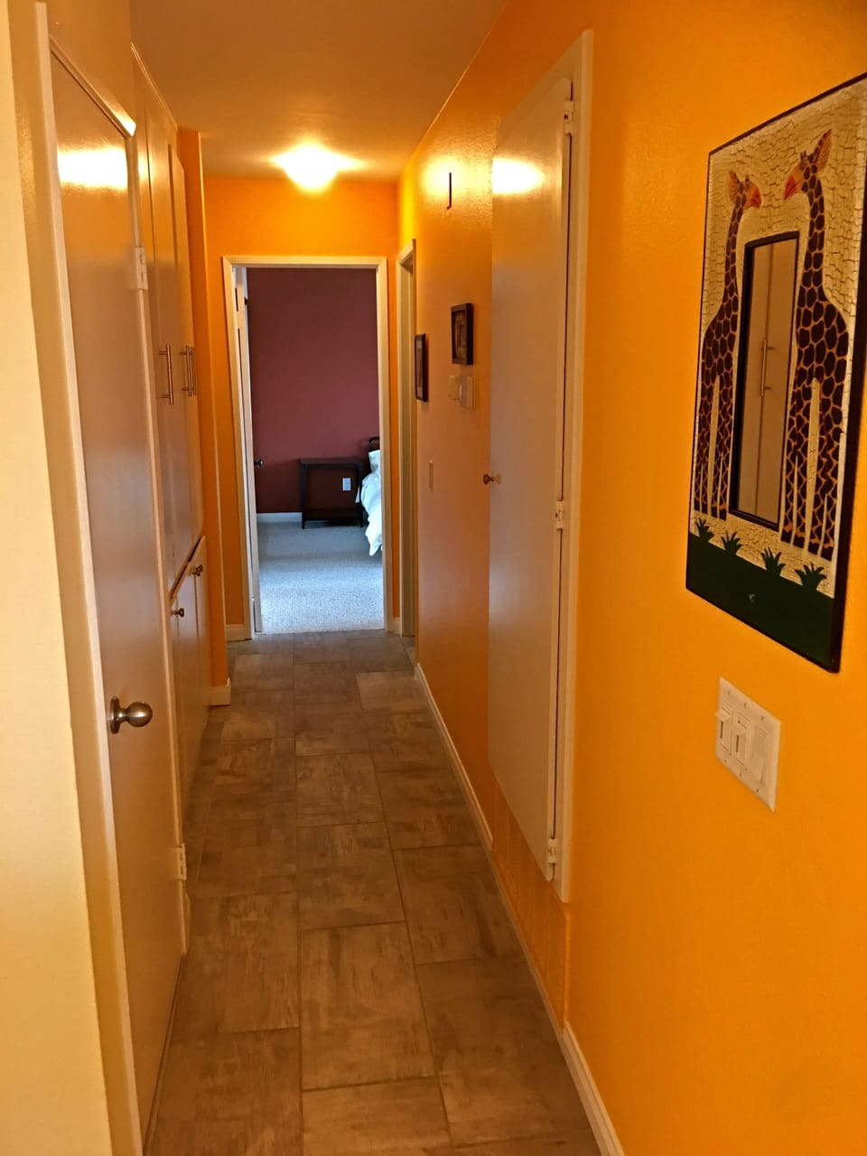 Back inside, head down the hallway to the bedrooms and bathrooms.