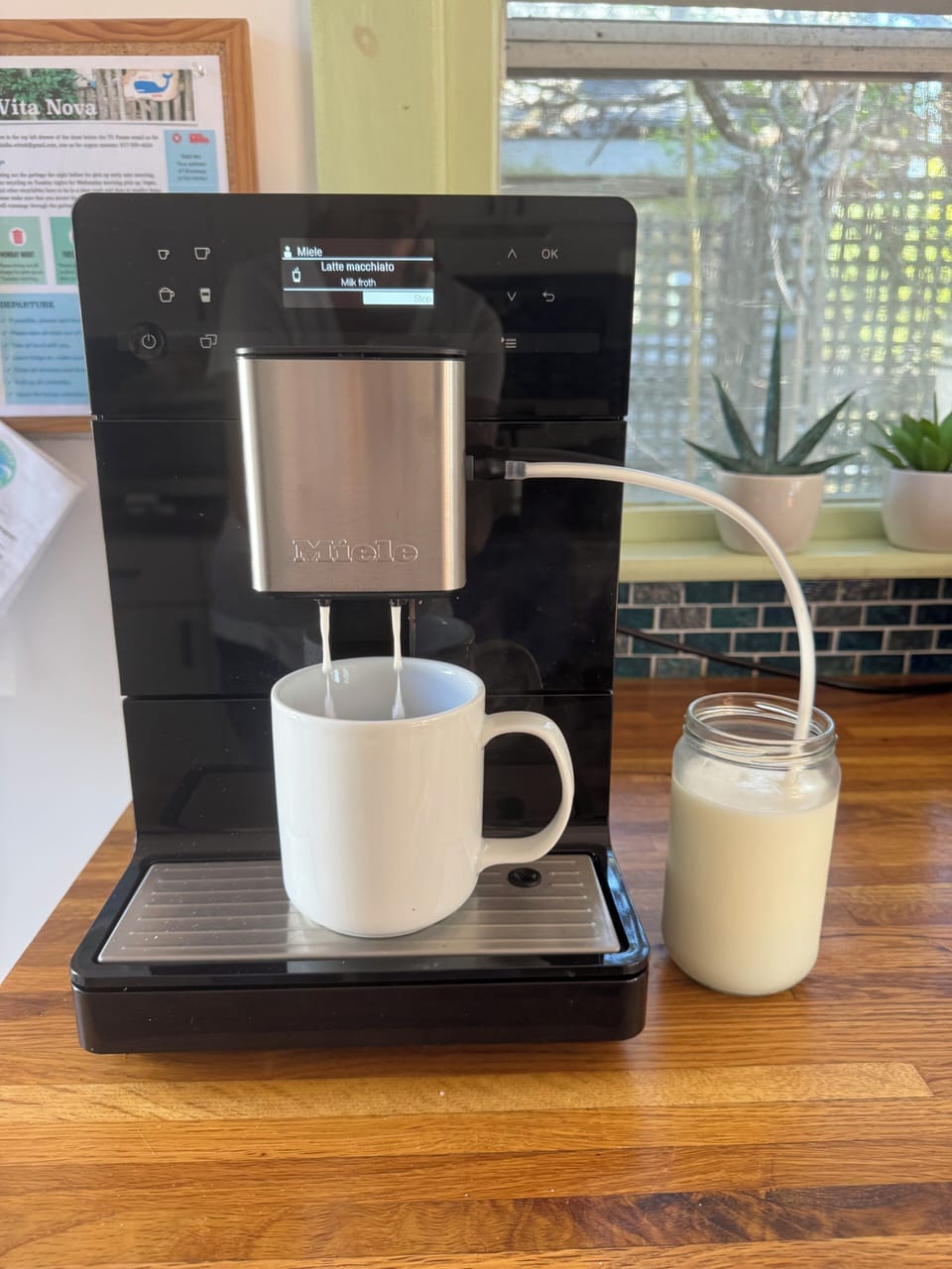 Miele super-automatic espresso machine foaming up my cappuccino.