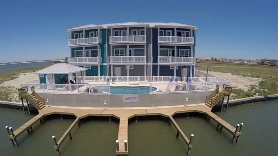 Waterfront/poolfront townhome, the middle grey unit.