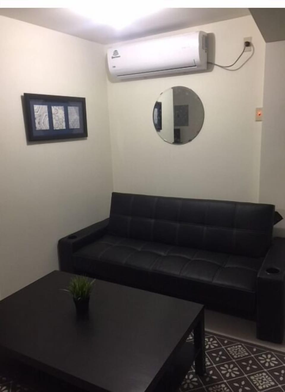 Living room futon sleep one person comfortably. 