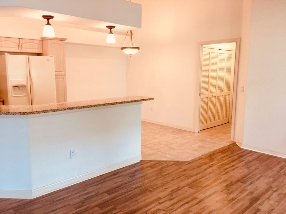 Two bedrooms locate at different sites of the condo separated by living area 