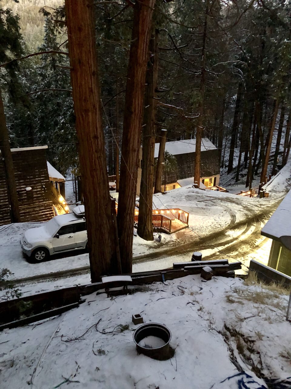 This picture shows both of our rental cabins and shop from our deck at our cabin
