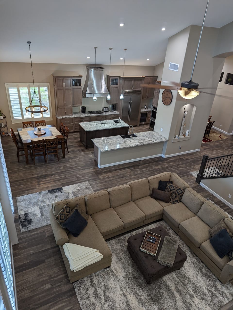 Views from loft to main floor family room, kitchen and dining room
