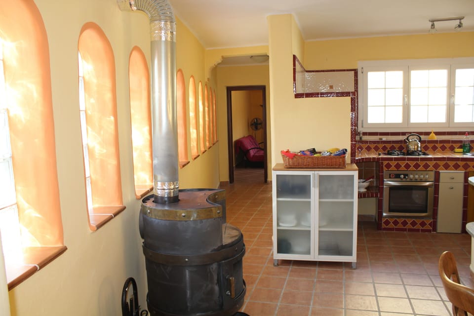 Looking from the dining area along the corridor to the lounge and front door