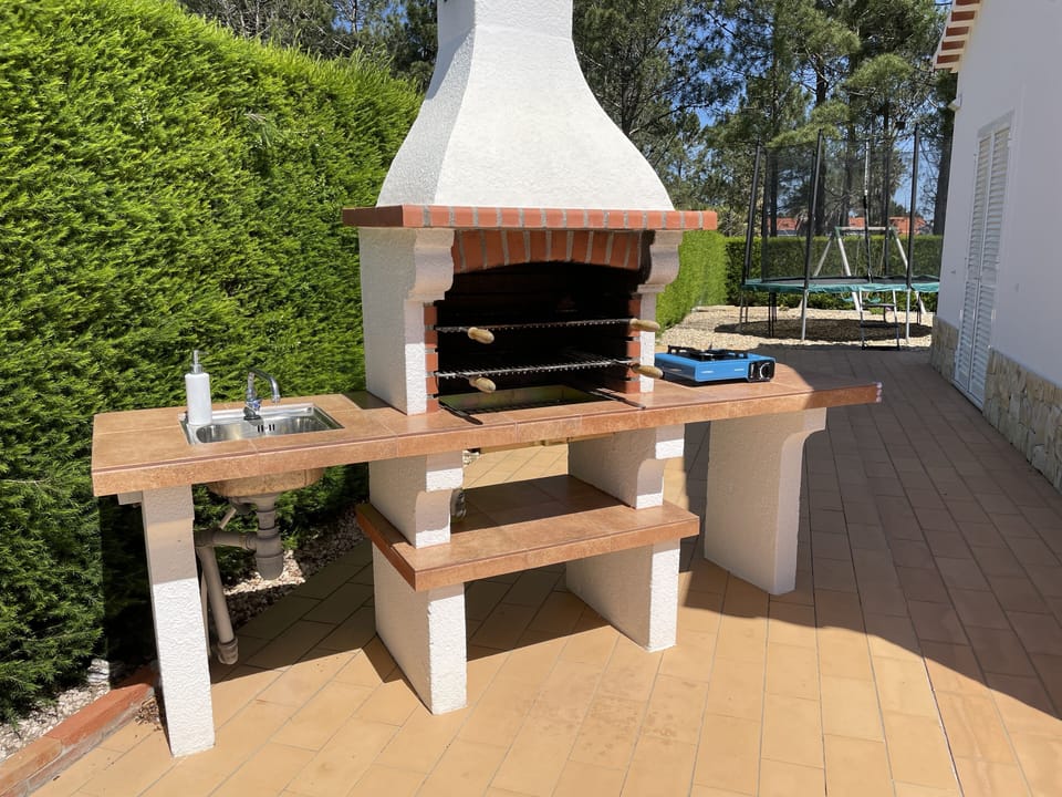 Barbecue with sink and gas ring for outdoor cooking
