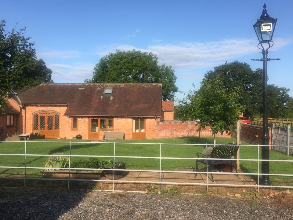 Coach House has a large garden with hot tub, fire bowl, BBQ, patio furniture etc