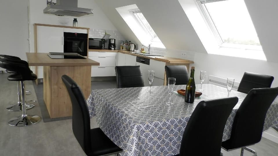 Dining area (6 persons) and kitchen area.