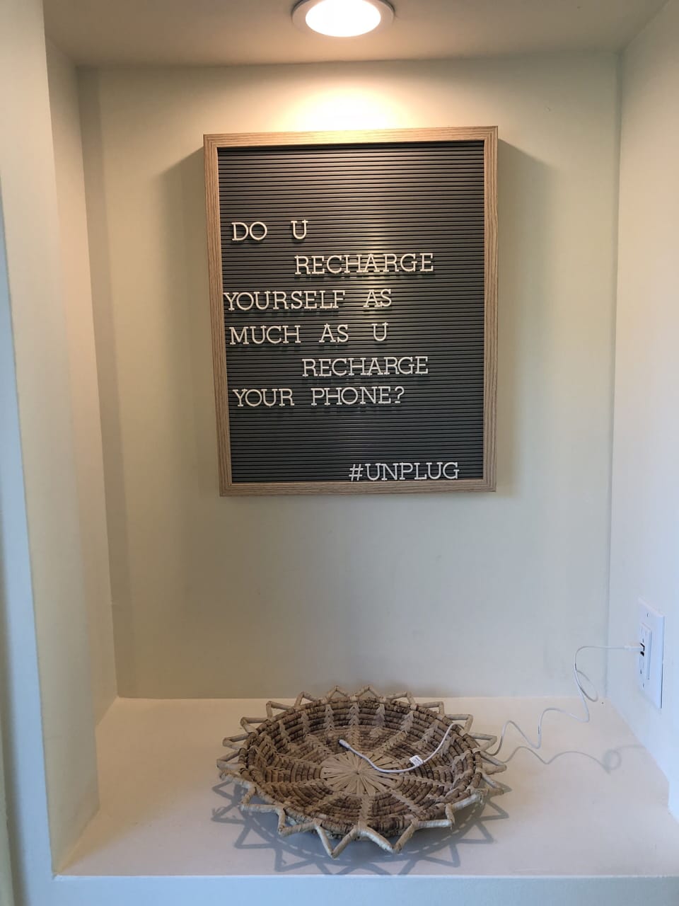 Charging station by front door so you can recharge your phone while YOU recharge