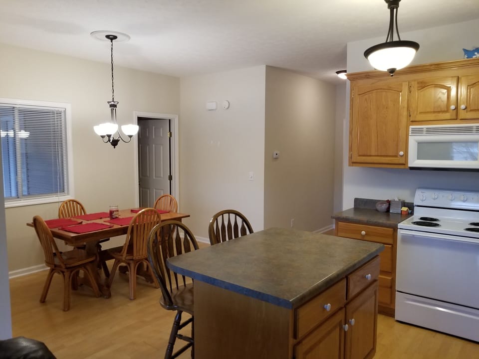 The kitchen is equipped with pots pans, coffee maker, dishes, silverware, etc.