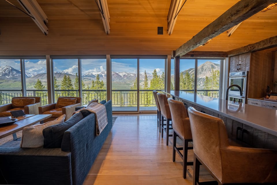 Wall-to-wall windows with incredible panoramic mountain views!