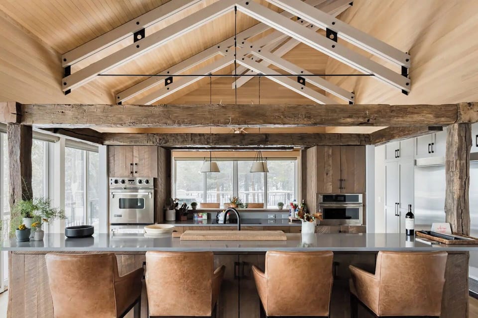 Floating kitchen in the great room with barstool seating.