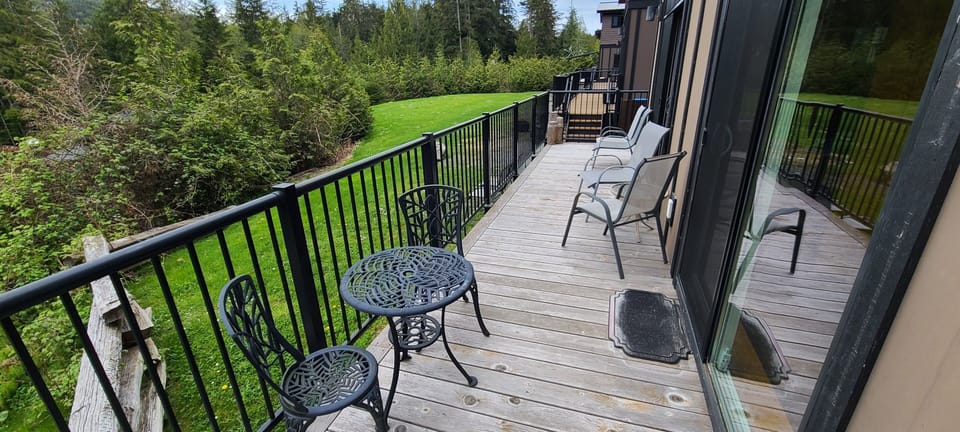 Back deck and public grassy area